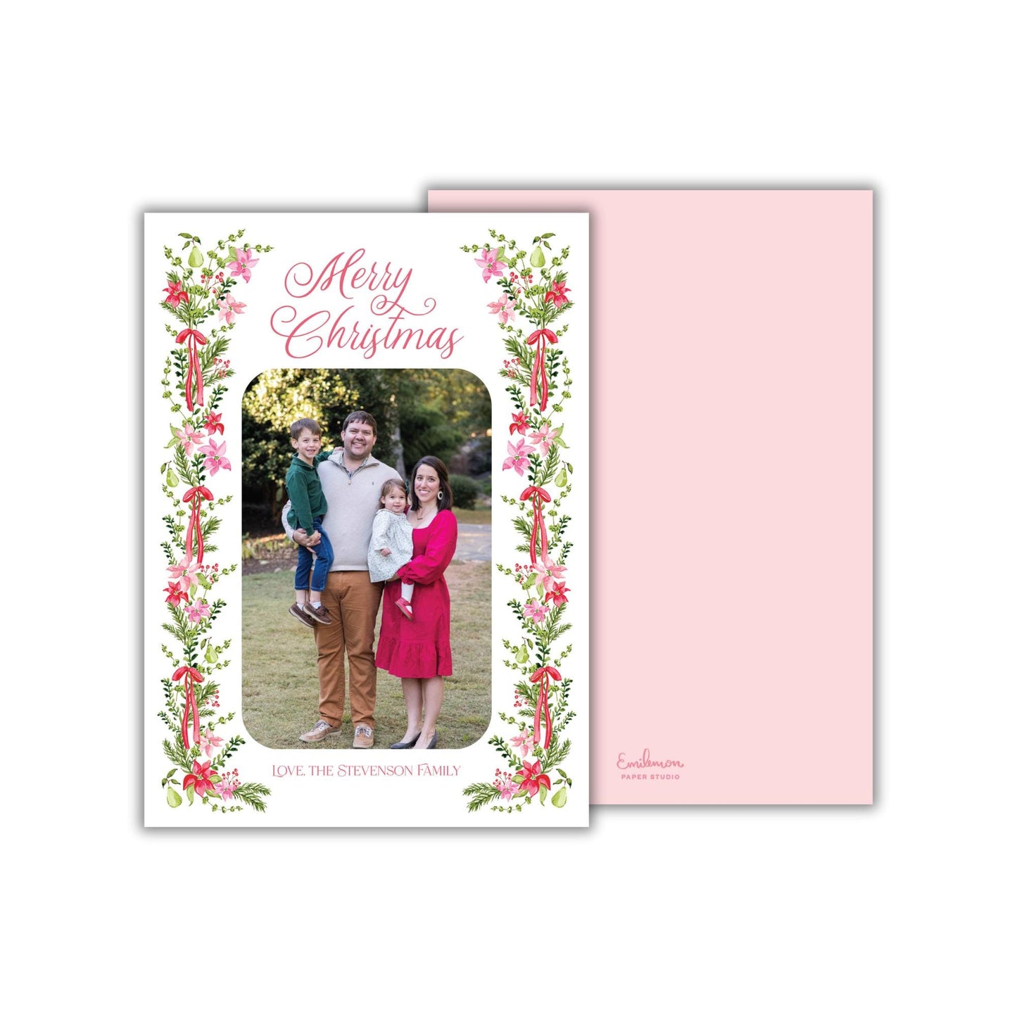 A family portrait of a man, woman, and child, surrounded by a floral border and the text "Merry Christmas" on a white background.