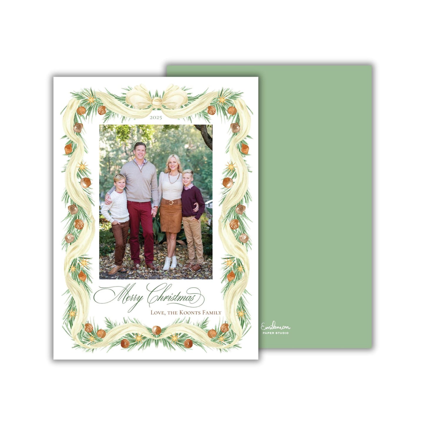 A family portrait of a man, woman, and two children, surrounded by a decorative border with a festive design.