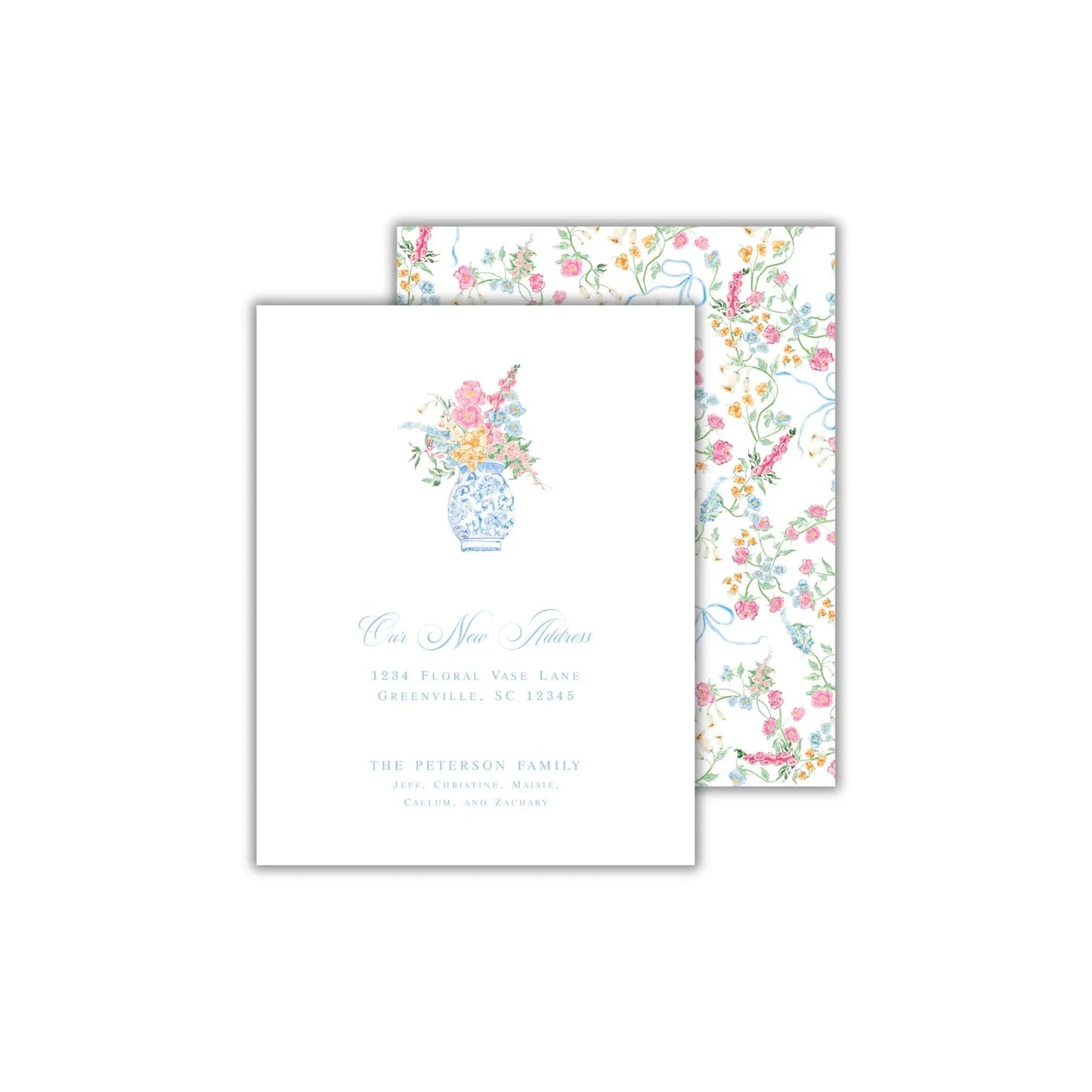 a wedding card with a vase of flowers on it