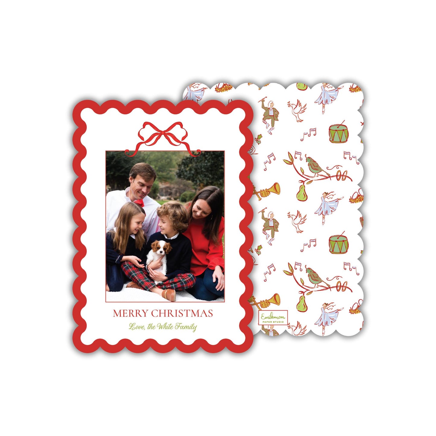 A Christmas card featuring a family photo of a man, woman, and two children, with a dog in the background. The card has a scalloped edge and a red bow, and the text "MERRY CHRISTMAS Love the White Family" is displayed.