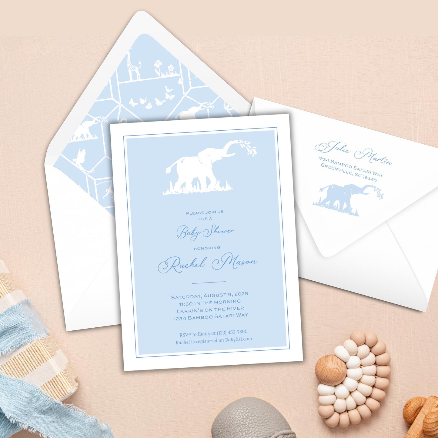 a baby blue elephant baby shower is on the table