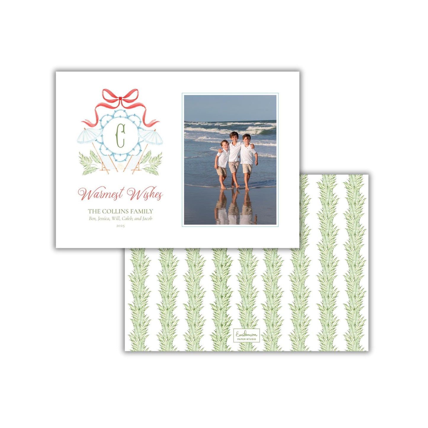 A greeting card featuring a photo of three children on the beach, along with a decorative element and text wishing warmest wishes.