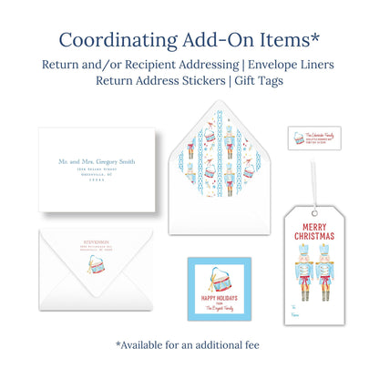 various items related to holiday-themed items, including envelopes, return address stickers, and gift tags.