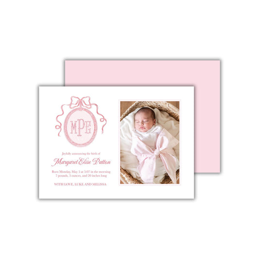a baby girl&#39;s birth announcement card with a picture of a baby in a