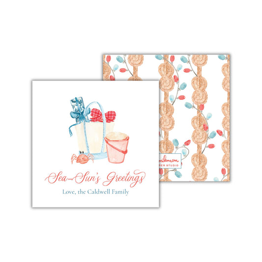 The image is a greeting card featuring a crab and a bucket, along with the text "Sea-Sun's Greetings Love, the Caldwell Family".