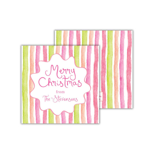 The image is a Christmas card with a watercolor striped background and a pink and white design. The card has a message that reads "Merry Christmas from The Stevens" and is decorated with colorful stripes.
