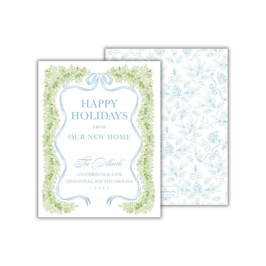 The image is a holiday card with a festive design featuring green and blue elements, including a ribbon border and a pattern of green leaves. The card is addressed to &quot;The Dallards&quot; and is from their new home, located at 1234 Christmas Lane in Greensville, South Carolina.