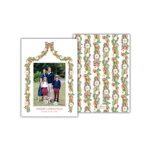 A family portrait of a family of four, with a floral garland around them, and a repeating pattern of green leaves on the right side of the image.
