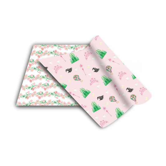 a pink wrapping paper with trees on it