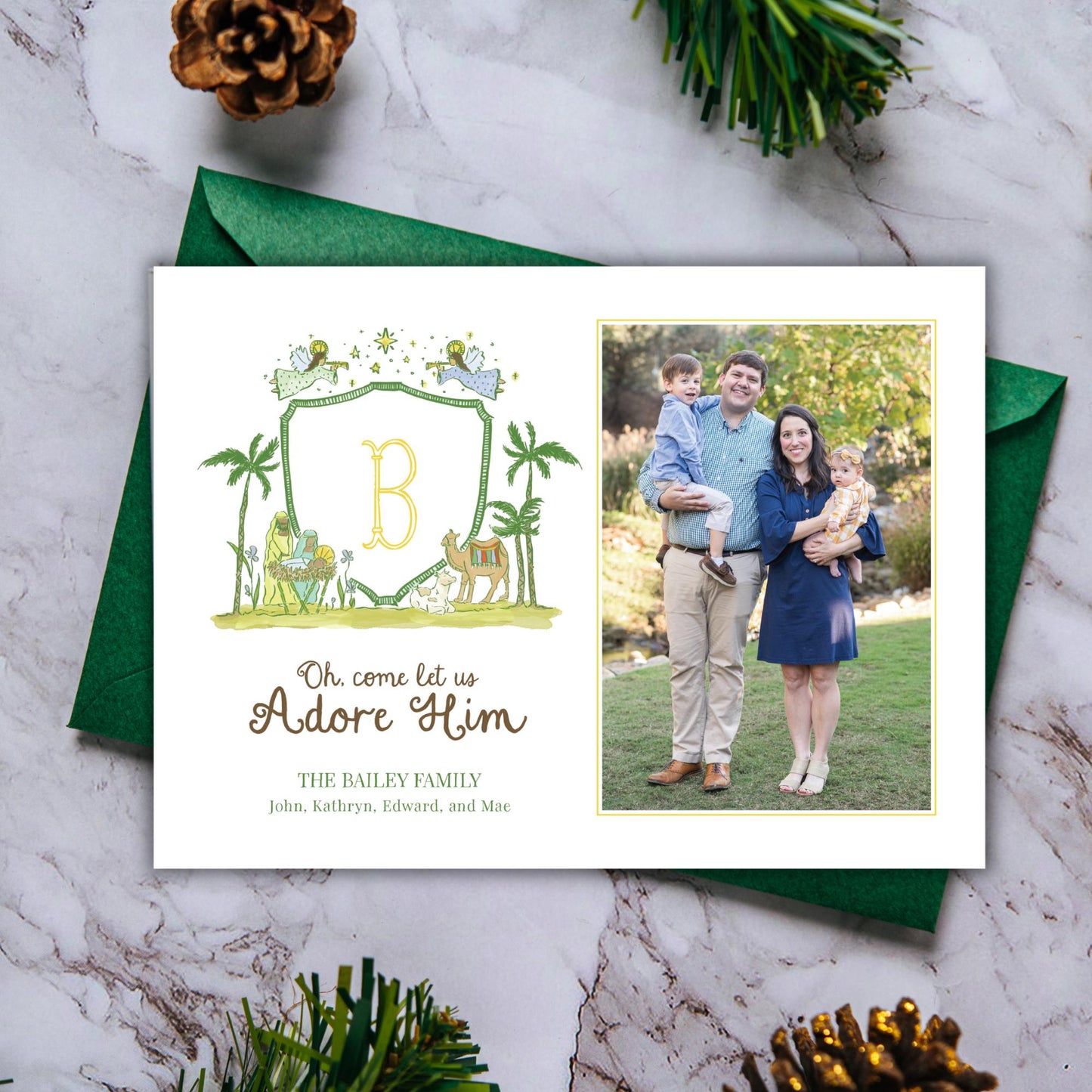 A holiday card featuring a family photo and a decorative border with a letter &quot;B&quot; and a palm tree illustration.