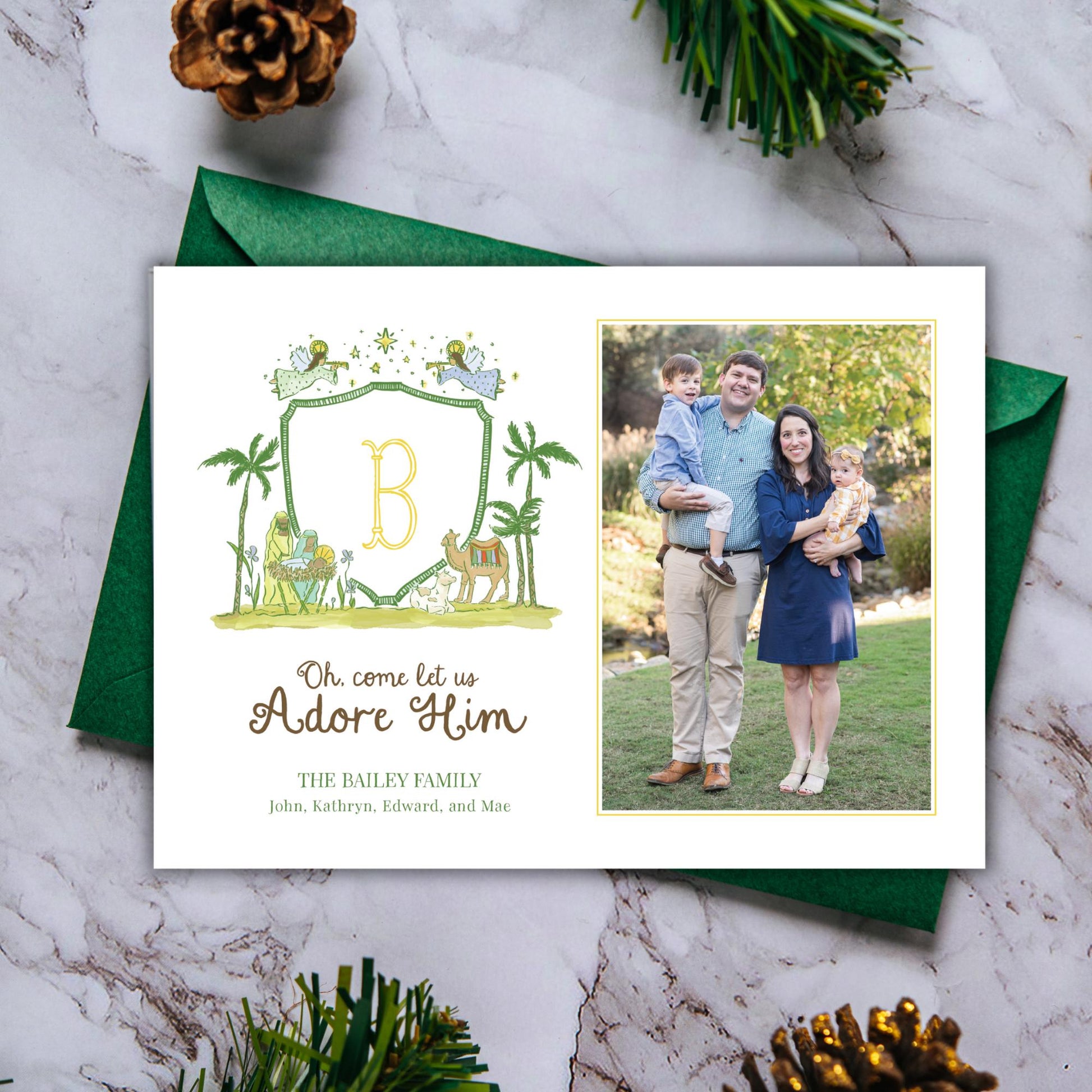 A holiday card featuring a family photo and a decorative border with a letter &quot;B&quot; and a palm tree illustration.