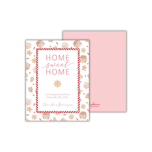 The image is a pink invitation card with a festive design featuring gingerbread cookies and other holiday-themed elements. The card has a pink background and a white border, and it displays the text &quot;HOME sweet HOME&quot; prominently in the center.
