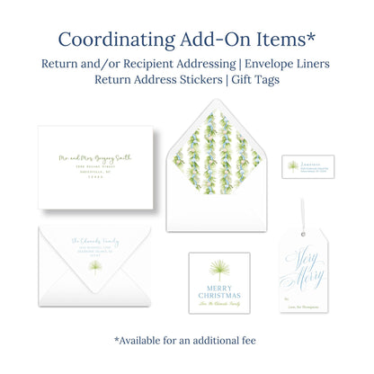 various items related to holiday-themed items, including envelopes, return address stickers, and gift tags.