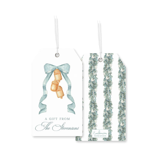 a pair of gift tags, one with a bow and bells, and the other with a green and white striped pattern.