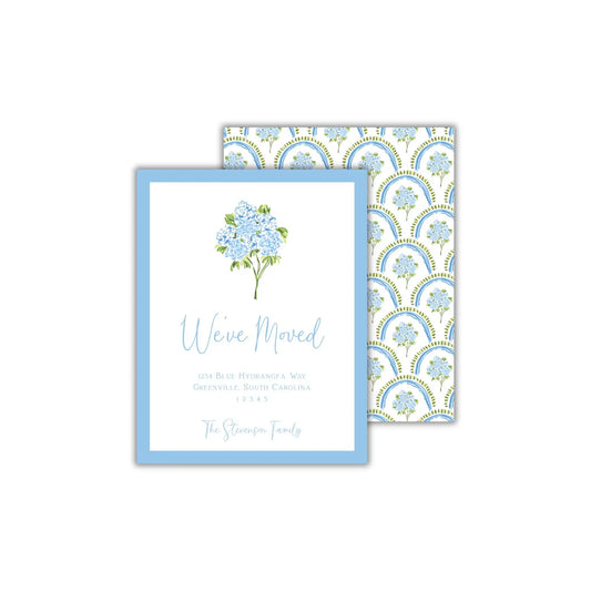 a card with a blue flower on it