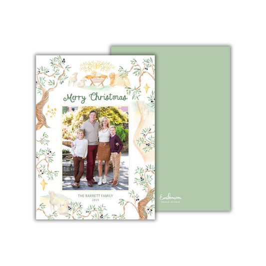 The image is a Christmas card featuring a family portrait of a family of five, with the text &quot;Merry Christmas&quot; and &quot;THE BARRETT FAMILY&quot; displayed.