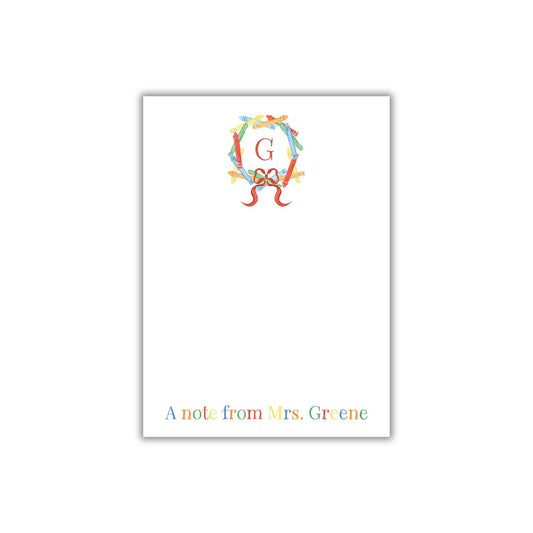 A personalized note from Mrs. Greene, featuring a colorful monogrammed letter "G" on a white background.