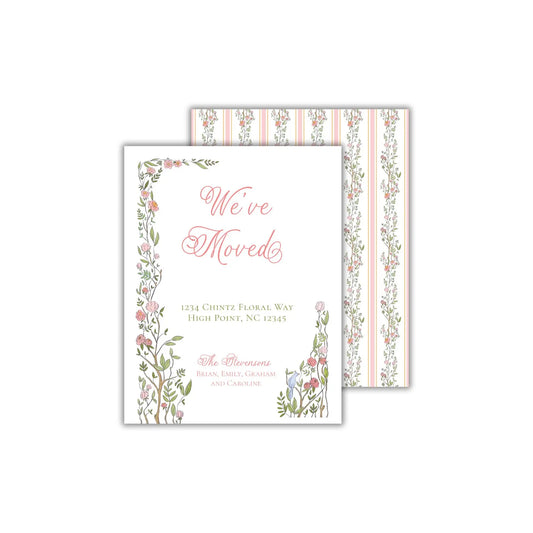 a wedding card with a floral border