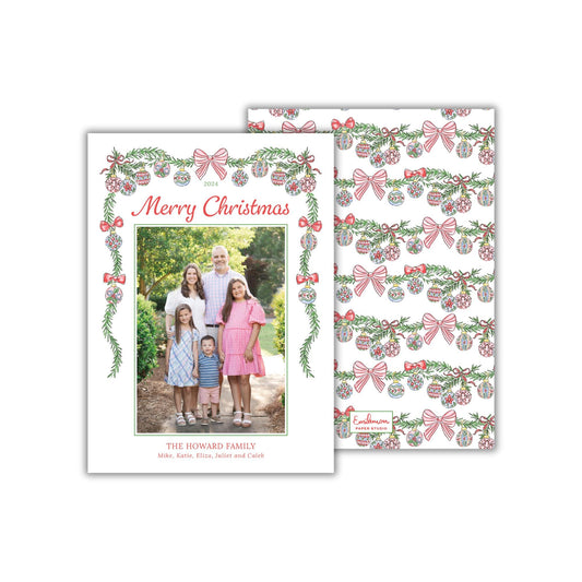 A family portrait of a group of people, including adults and children, with a Christmas-themed design featuring red and green bows and ornaments.