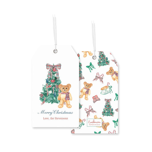 two white tags with Christmas-themed illustrations and text.
