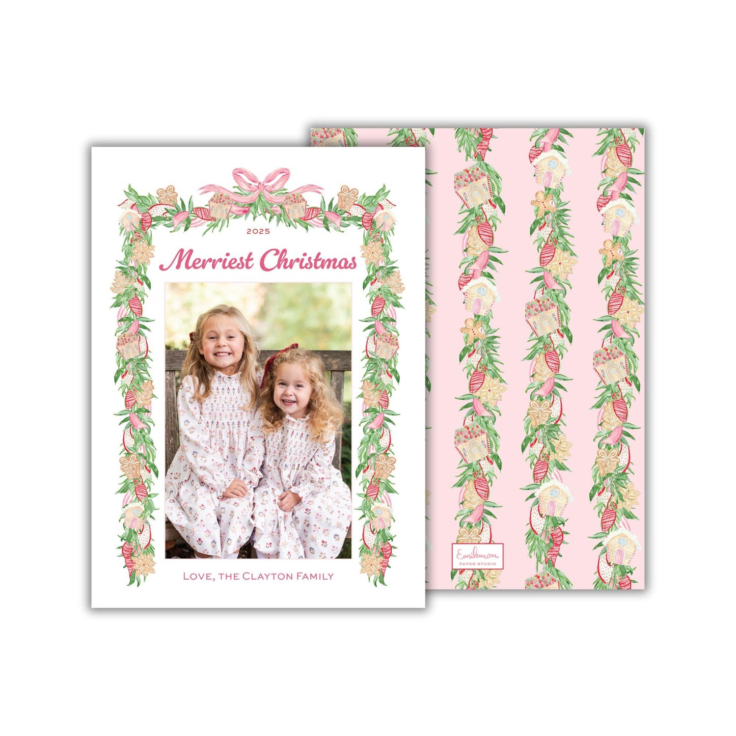 A 2015 holiday card featuring two young girls in a festive floral frame, with a pink and green color scheme.