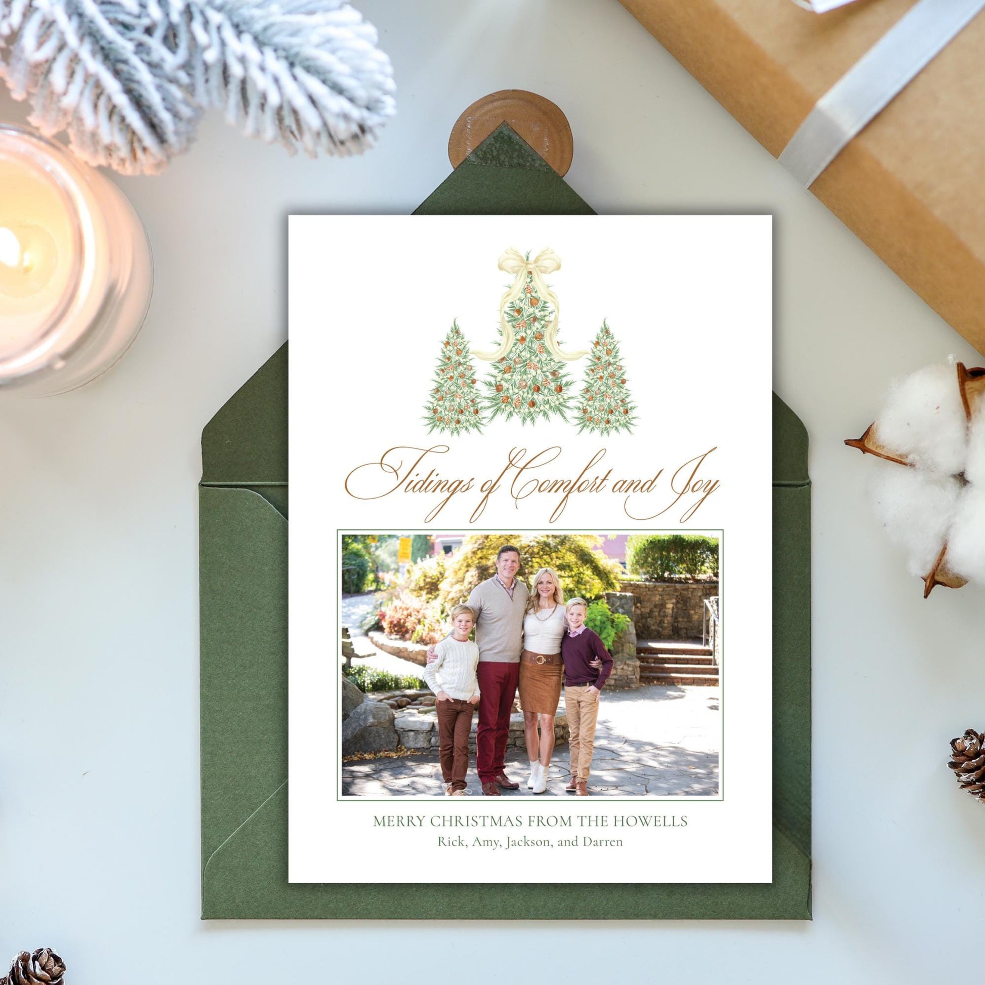 The image is a Christmas card with a family photo and a holiday-themed design.