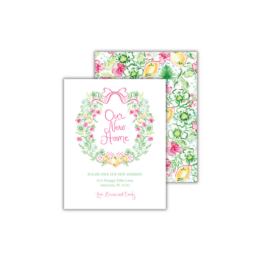 a card with a floral wreath on it