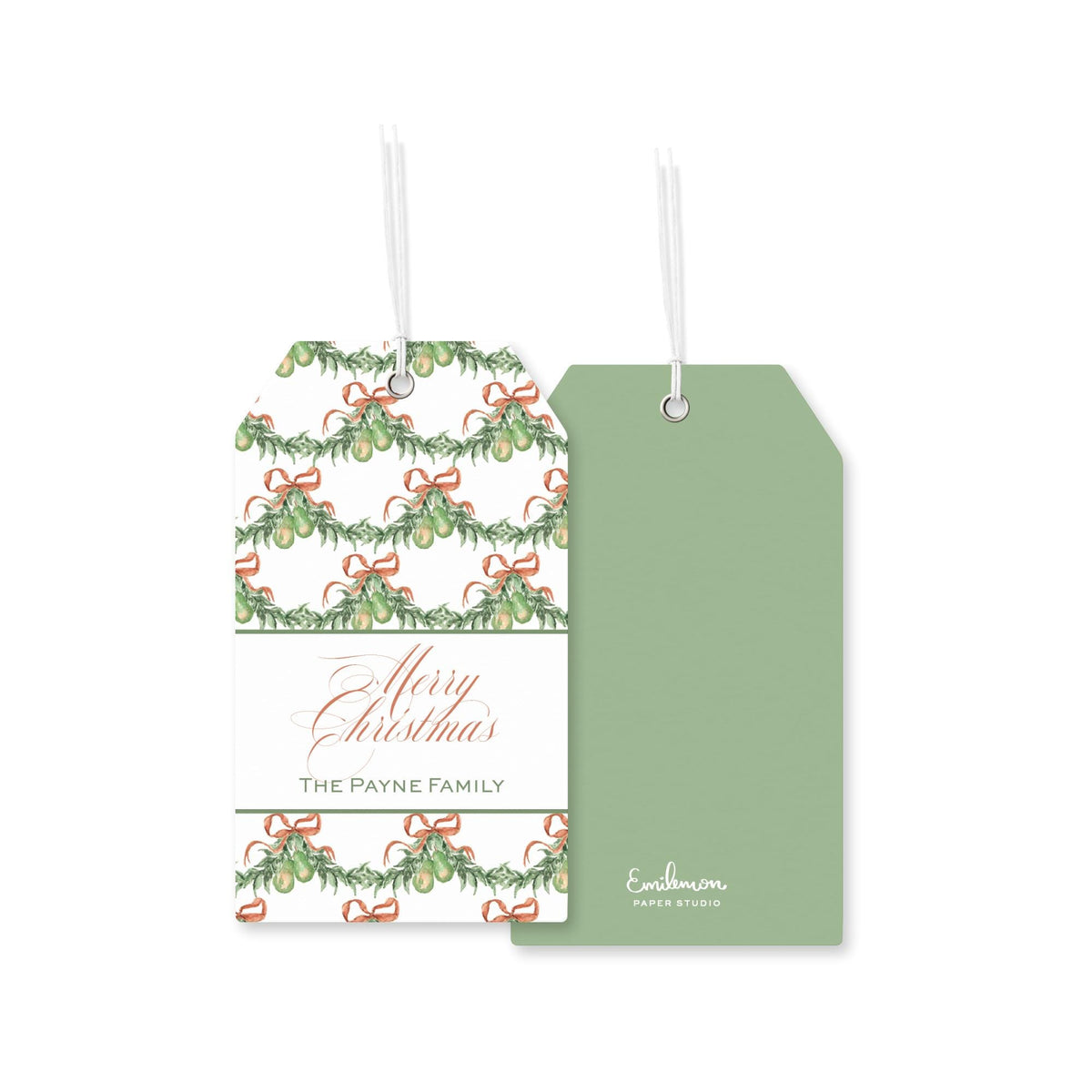 two tags, one with a Christmas-themed design and the other with a plain green background.