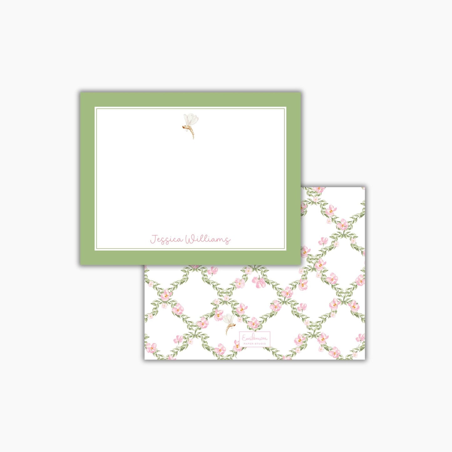 a green-framed note card with a floral pattern and a blank space for writing a personalized message.