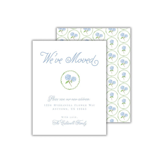 a wedding card with blue flowers on it