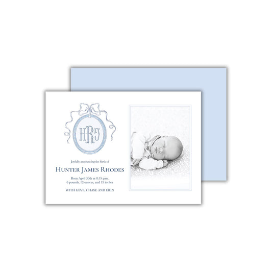 a baby&#39;s birth announcement card with a picture of a baby