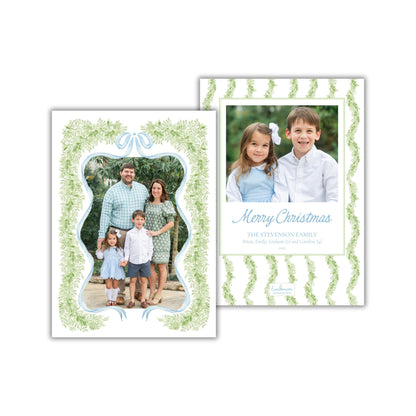 The image is a family portrait of a man, woman, and two children, with a decorative border and a "Merry Christmas" greeting.