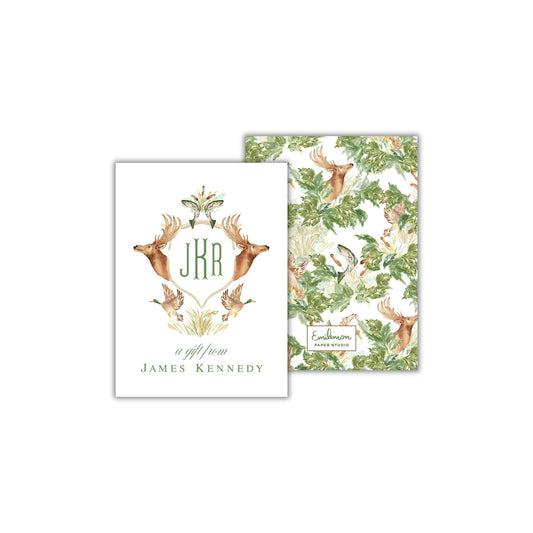 The image is a monogrammed greeting card featuring a deer and bird motif, with the initials "JK" prominently displayed. The card is presented in two different orientations, with the front side showing the monogrammed design and the back side displaying a patterned background.