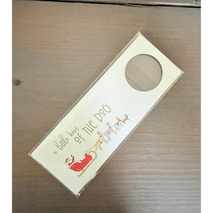 A white door card with a Santa Claus image and the text "a little bit of the D20" printed on it.
