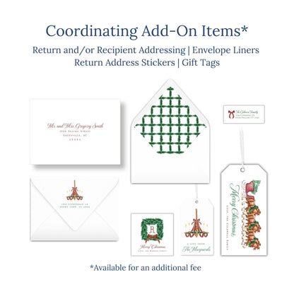 various items related to holiday greetings, including envelopes, return address stickers, and gift tags.