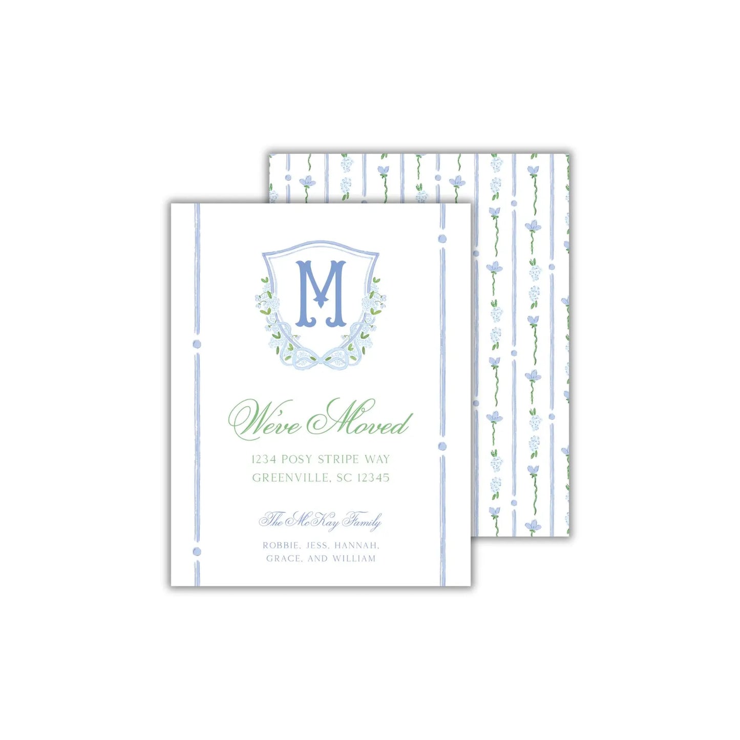a white and blue wedding card with a monogrammed initial