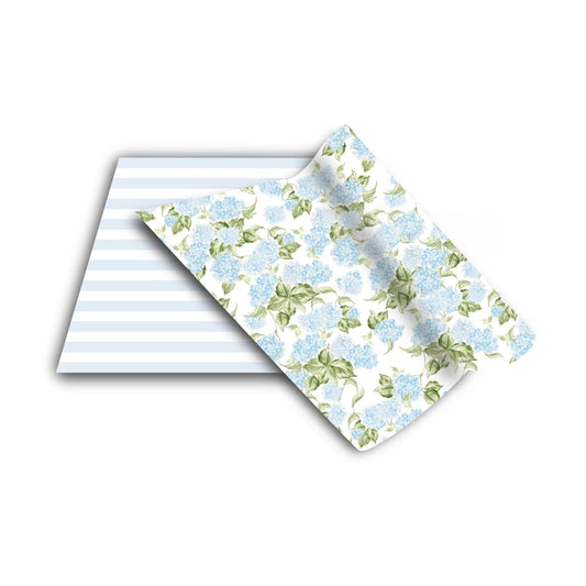 two pieces of paper with blue flowers on them