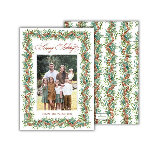 A family portrait of a group of people, surrounded by a decorative border with a floral pattern.