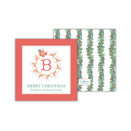 a Christmas card with a red frame and a white background. The card features a large number 8 and a wreath design, along with the text &quot;MERRY CHRISTMAS With love, the Brown Family&quot;.