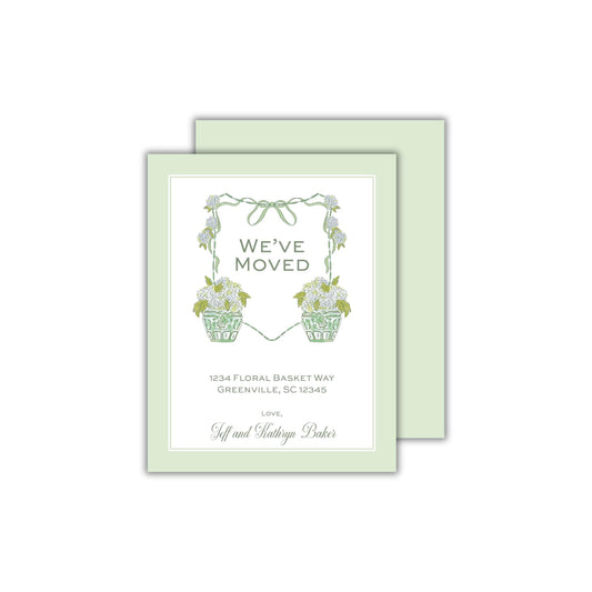a green and white wedding card with flowers