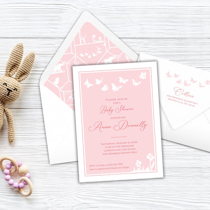 a stuffed animal next to a pink and white wedding card