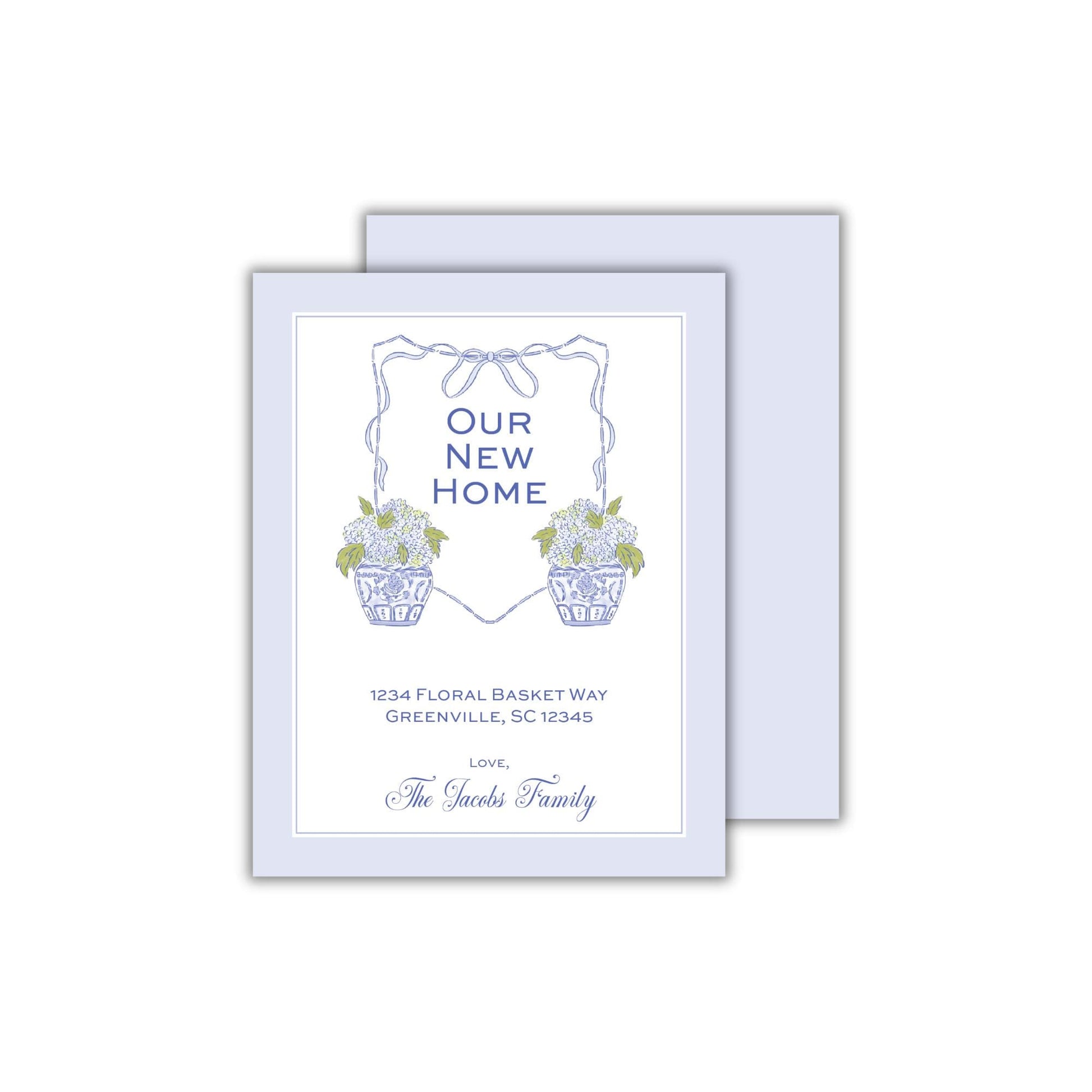 a blue and white card with flowers in a basket