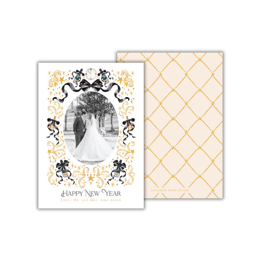 A wedding invitation card with a bride and groom photo in the center, surrounded by decorative elements and text.