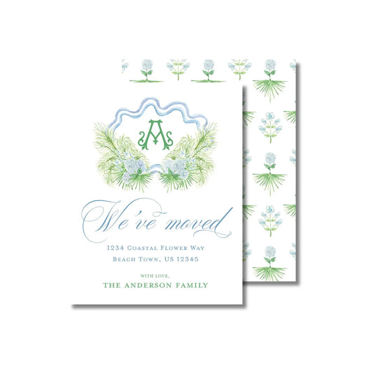 a white and green wedding card with a floral design