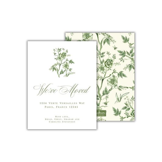 a white and green wedding card with a floral design