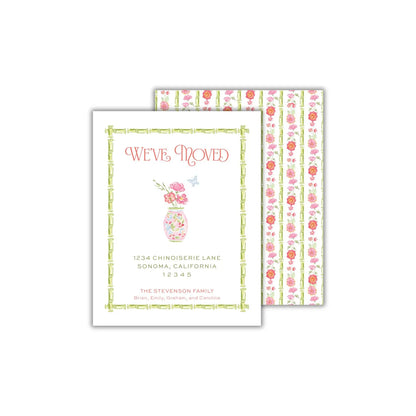 a card with a flower vase on it