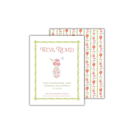 a card with a flower vase on it