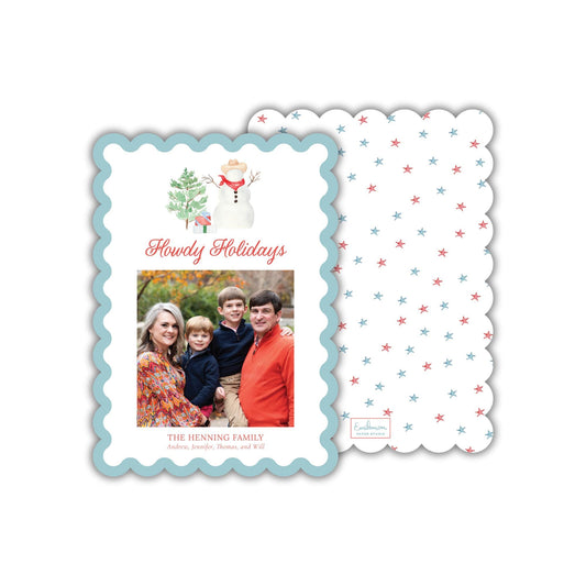 A family portrait of a family, including a snowman, is displayed on a card with the text &quot;Howdy Holidays&quot; and &quot;The Henning Family&quot; written on it.