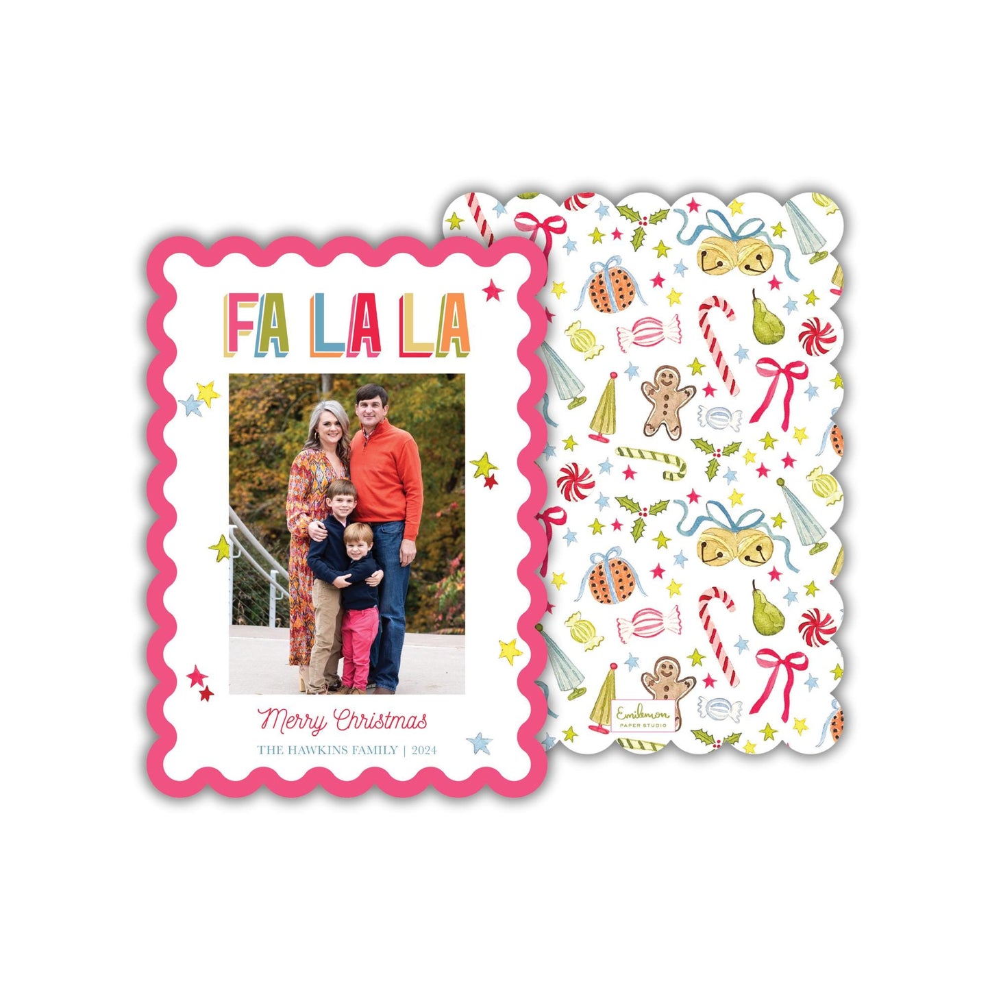 A family photo is displayed on a pink frame with a scalloped edge, surrounded by a festive pattern of Christmas-themed illustrations.