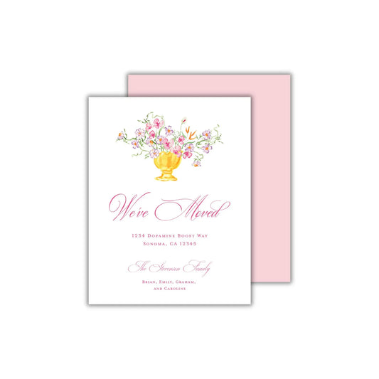 a pink and white wedding card with a vase of flowers